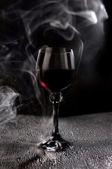Beautiful large wine lamp isolated on a white background. Transparent wine glass on a white background