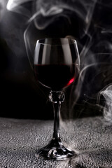 Beautiful large wine lamp isolated on a white background. Transparent wine glass on a white background