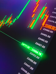 Closeup financial chart with candlestick graph in stock market on monitor background. stock...