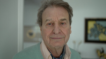 Intimate Portrait of an Elderly Man in His Home - Calm and Insightful Expression with Gentle Eyes