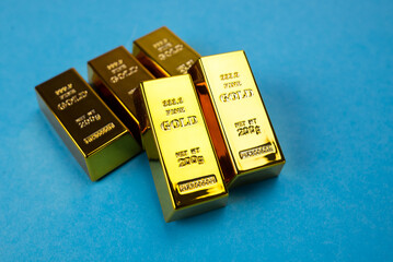 gold bars on a blue