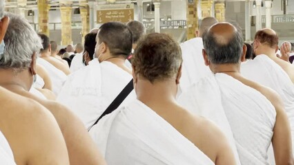 Mecca, Saudi Arabia - 18 FEB 2022 circa: Multiracial Crowd of Muslims Doing Worship Around the Kaaba in the Masjid al-Haram in Mecca. Concept of Islam, Umrah, Islam, Hajj, Unity