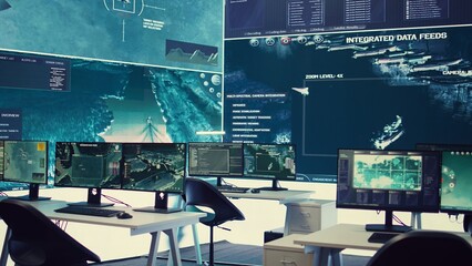 Federal anti terrorism command center with a big screen and radar surveillance used for...