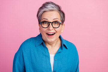 Photo portrait of attractive senior woman excited reaction dressed stylish blue clothes isolated on...