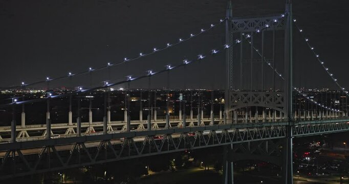NYC New York Aerial v277 drone flyover East river capturing interstate freeway traffic on RFK bridge, connecting Astoria Queens and Randalls Island at night - Shot with Inspire 3 8k - September 2023