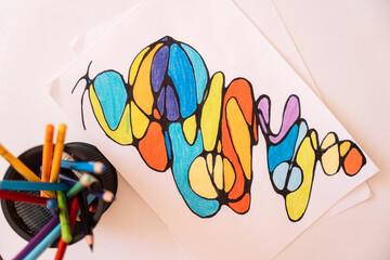 Neurographic drawing colored with colored pencils on white paper.