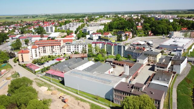 Prudnik's urban and industrial areas, modern buildings, green spaces, and the scenic countryside. Prudnik, Poland - Prudnik, Polska