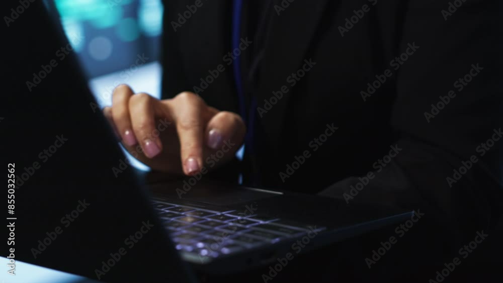 Poster programmer in server hub checking recovery plan on laptop, monitoring energy consumption across main