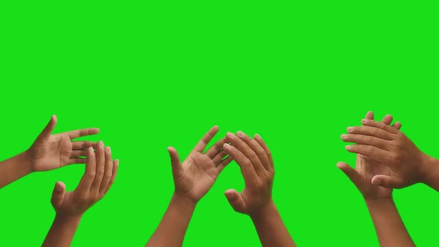 Applause effect with hands clapping on a green screen background. Concept of victory and awards with copy space.