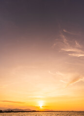 sunset over the sea vertical