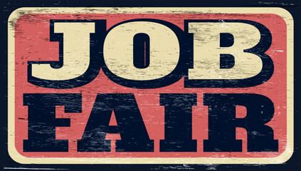 Aged and worn job fair sign on wood