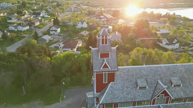 Buksnes Church, Norway at Sunset: fantastic aerial view over the beautiful church during the sunset.