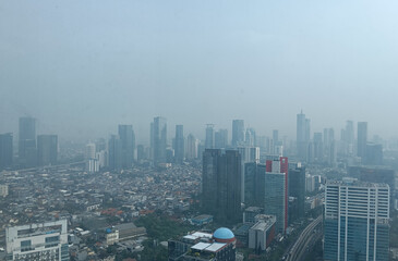 Obraz premium skyscrapers with trees in the early morning