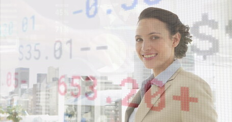 Image of financial data processing over caucasian businesswoman working at office