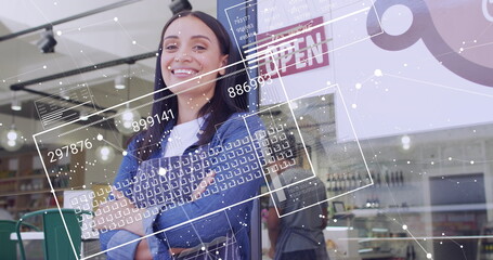 Image of financial data processing over biracial woman in cafe