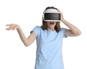 Emotional woman using virtual reality headset on white background