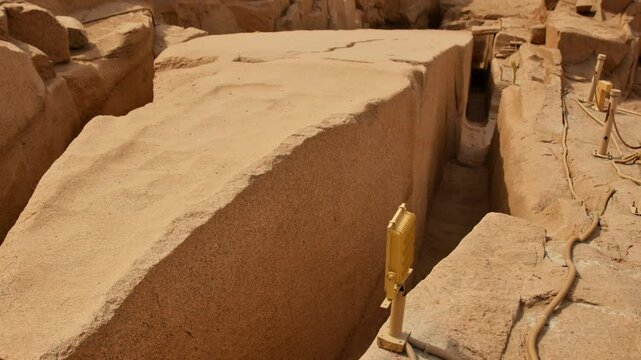 Panoramic close up of unfinished obelisk at the stone quarries of ancient Egypt in Aswan.
