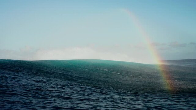Rainbow Teahupo'o wave monstrous famous surfing barrel Tahiti French Polynesia slow motion foam ball coral reef Paris summer Olympics 2024 offshore wind dreamy Passe Havae Faremahora Pacific Ocean pan