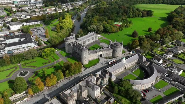 Kilkenny Castle, County Kilkenny, Ireland, September 2023. Drone orbits with views of the elegant formal gardens and Design Center and Workshops in the foreground.