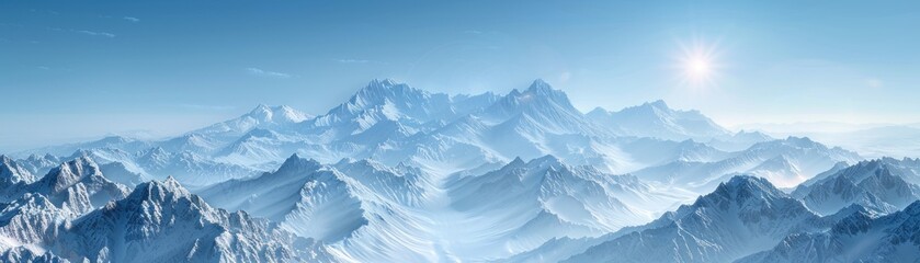 Snowy mountain peaks under a clear blue sky.