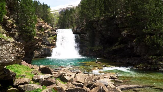 Waterfalls of the Gradas de Soaso: Nature at its Maximum Expression captured in a 4K video from the Ordesa Meadow, Ordesa y Monte Perdido National Park, Aragon Pyrenees, Huesca, Spain
