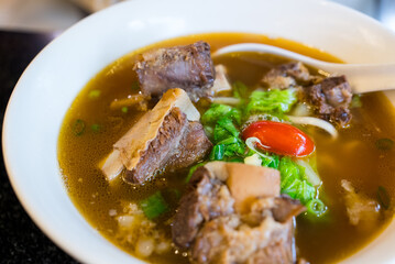 Taiwanese famous food with sliced red braised beef noodles