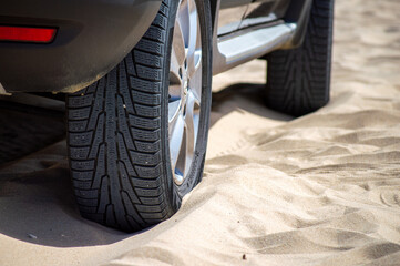 Car on sand on Valdevaqueros Dune in Tarifa, Strait of Gibraltar, Spain
