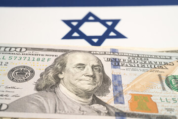 US dollar banknotes on Israel flag background, Business and finance.