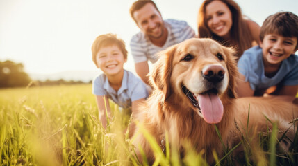 Happy family with with kids playing outside in a field with their family dog. Camping, travel, hiking