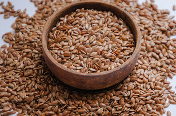 brown flax seed in a brown dish