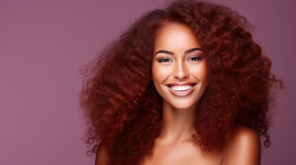 Fototapeta premium Beautiful, sexy, happy smiling dark-skinned African American woman with perfect skin and red hair, on a purple background, banner.