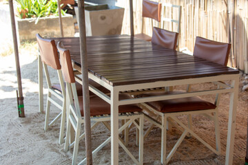 Tables and chairs in a street cafe
