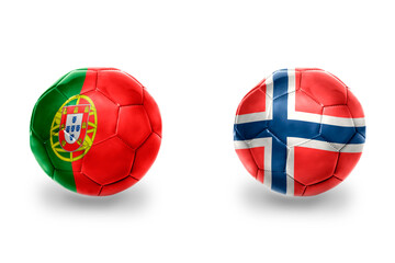Obraz premium football balls with national flags of norway and portugal ,soccer teams. on the white background.