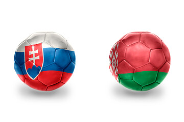 Fototapeta premium football balls with national flags of belarus and slovakia ,soccer teams. on the white background.