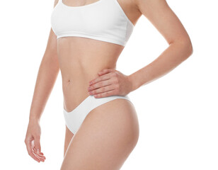 Woman with slim body posing on white background, closeup