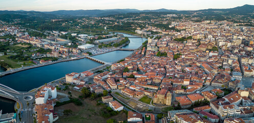 Panoramic aerial view of Spanish Galician city PONTEVEDRA. View of old town center with historic buildings. Cathedral of Pontevedra. River Lerez crossing the city. Famous travel destination.