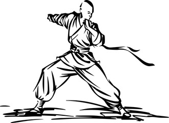 A man in a karate uniform is in a pose, ready to strike