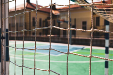 Football net with goal in school yard