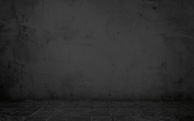 dark black concrete perspective room for advertising. stamp concrete floor in grid pattern with weathered black concrete wall background. black backdrop space for displayed product.