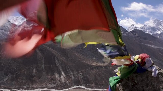 prayer flags in nepal mountain range himalayas