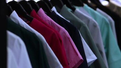 Doctor and nurse uniforms hang on a clothes hanger in the hospital. Clothing used by a doctor, nurse or patient for hygienic purposes. Doctor or nurse medical uniforms. horizontal video.