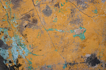 Stained and peeling wall texture with different paint colors in Brazil