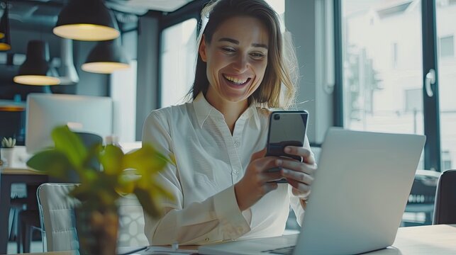 Happiness Entrepreneur beautiful business asian young woman wear casual use mobile phone for shopping online enjoy with social media and laptop at home.