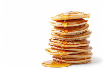 Pancakes stacked on top of each other with syrup dripping down