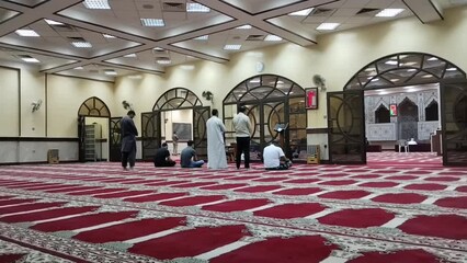 Farwaniya, Kuwait - June 18 2024 : People praying in the mosque.