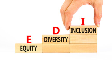 EDI equity diversity inclusion symbol. Concept words EDI equity diversity inclusion on wooden blocks. Beautiful white background. Business EDI equity diversity inclusion concept. Copy space.