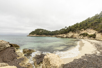 Overcast Day at Cala Mitjana Beach, Menorca