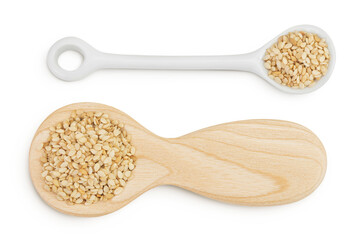 Sesame seeds in wooden and ceramic spoon isolated on white background. Top view. Flat lay