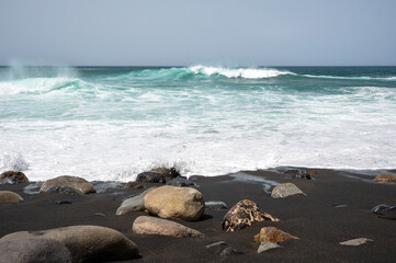 Waves crashing over rocks at Ajuy, Fuerteventura, Spain
