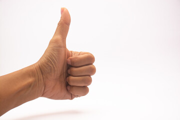 left hand thumbs up seen from palm side isolated on white background.